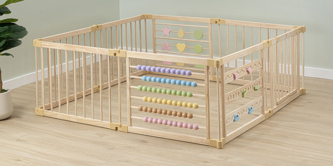 ZETY wooden activity playpen set up as a square enclosure on a wood floor