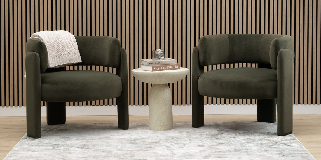 ZETY natural oak acoustic slat wall panels behind two lounge chairs