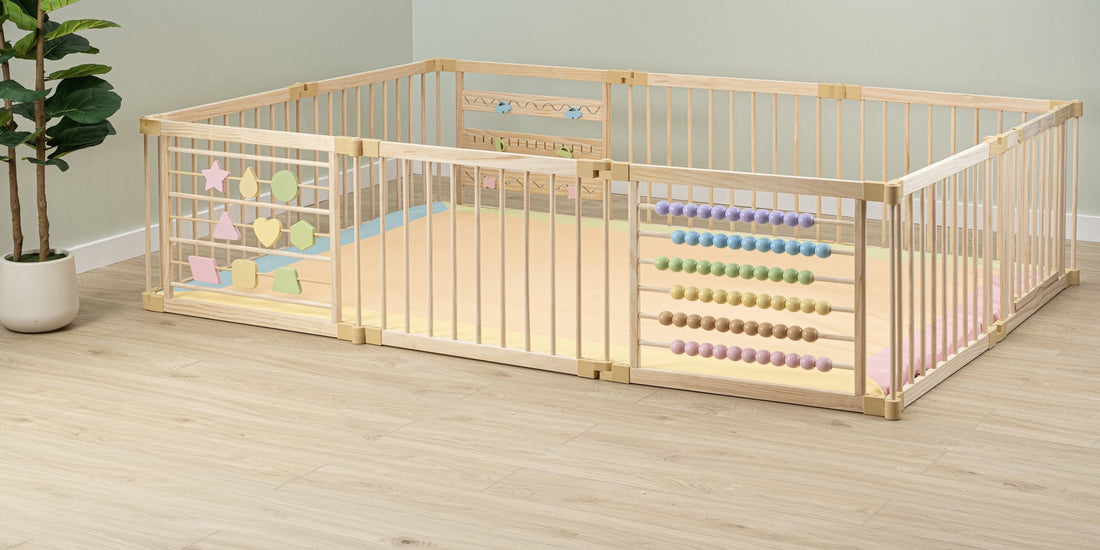 ZETY wooden playpen with a colored play mat fitted inside