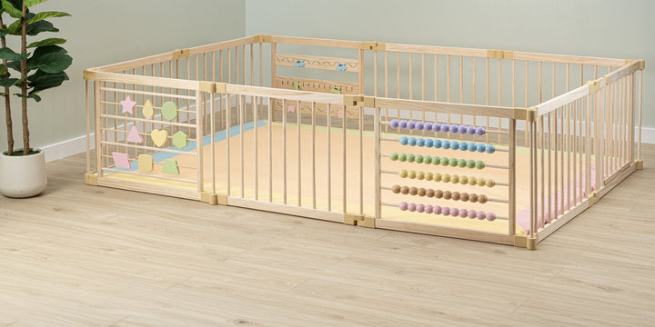 ZETY wooden playpen with a colored play mat fitted inside