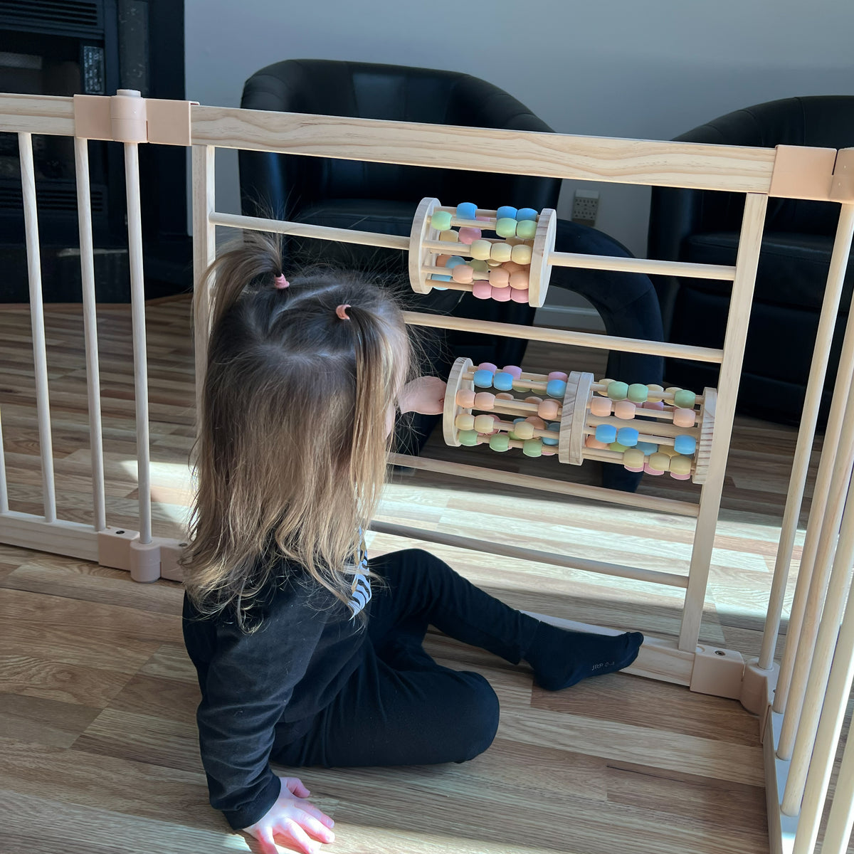 Wooden playpen expansion panel with a built-in rolling cylinder toy, ZETY