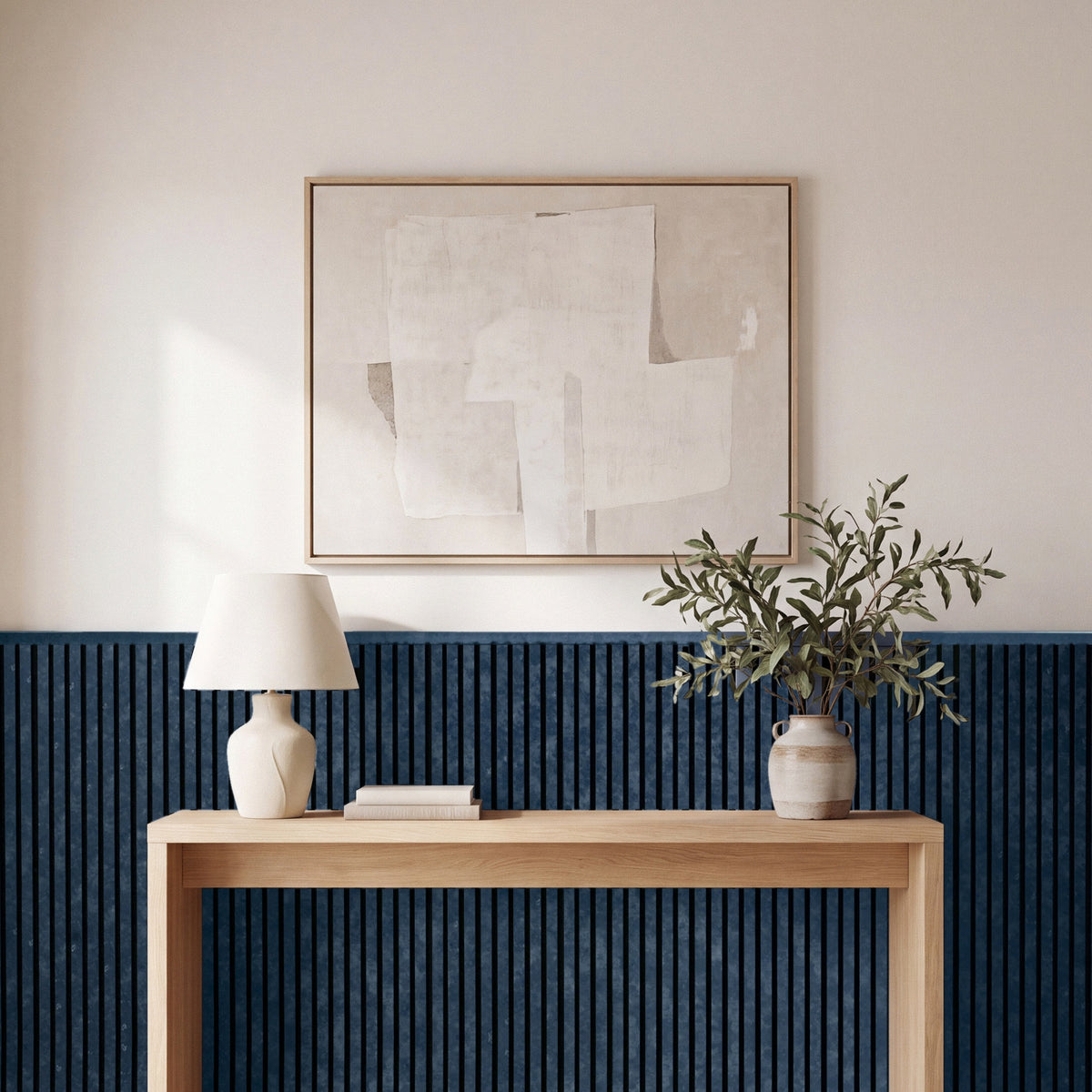 Blue acoustic wainscot panels as a half-wall accent behind furniture in a living space