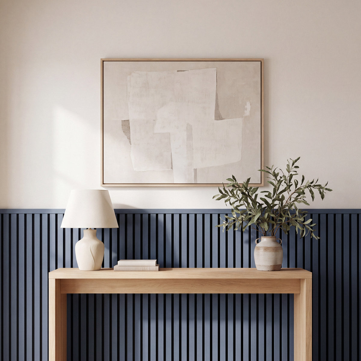 Blue acoustic wainscot panels as a half-wall accent behind furniture in a living space