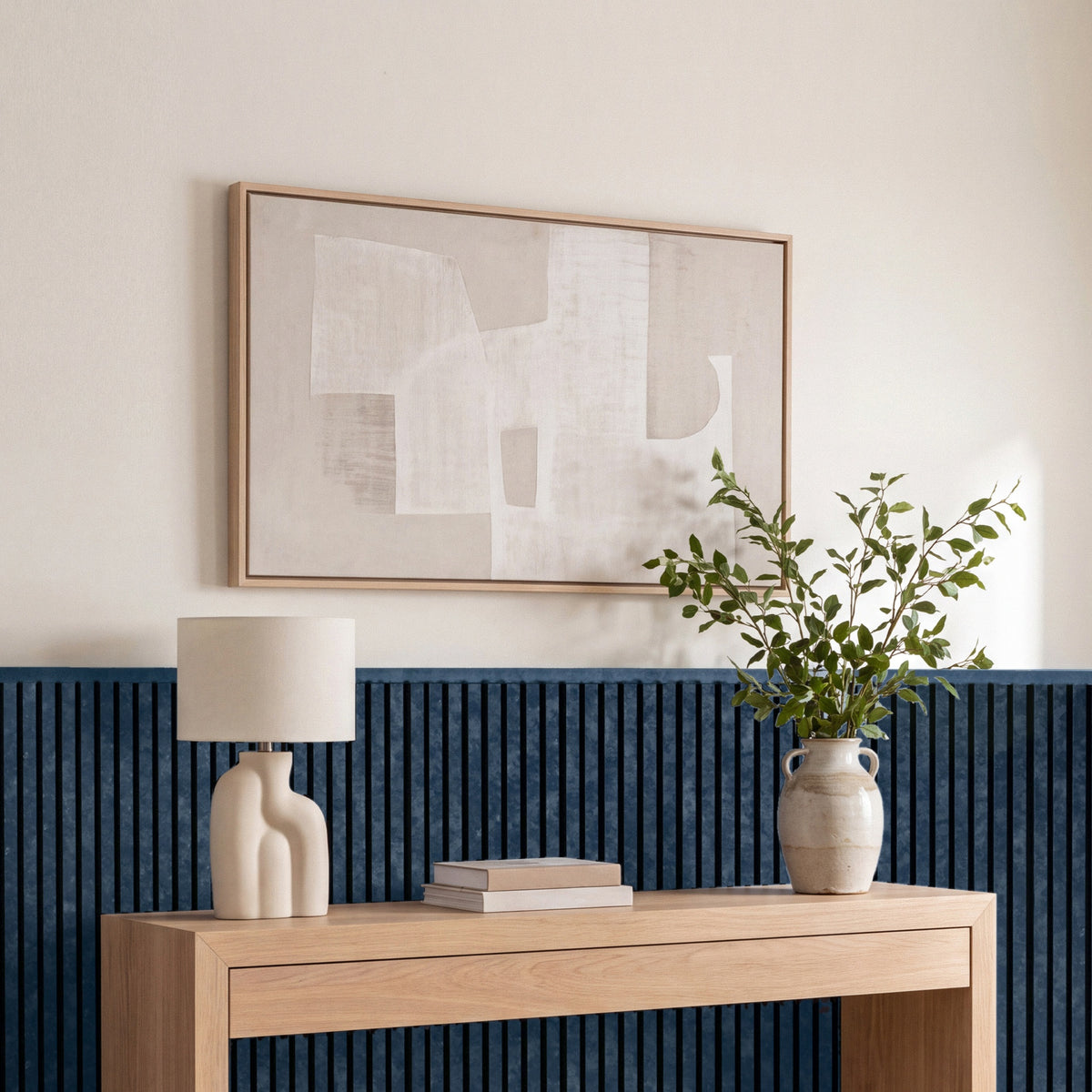 Blue wainscoting panels running along a bedroom wall with coordinating top molding