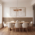 Oak slat wainscoting panels installed as half-wall paneling in a styled interior