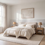 White slat wainscoting panels installed as half-wall paneling in a styled interior