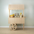 Wood-look candy cart with canopy, counter and spoked wheels styled with candy jars